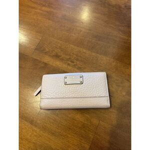 Woman’s leather Kate Spade, New York wallet, soft pink